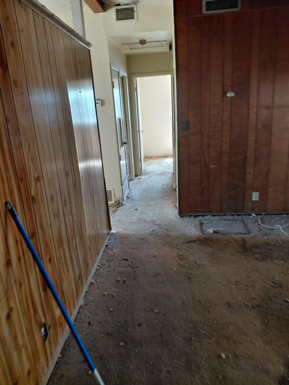 Wood-panel hallway at 1203 Rossolis Dr